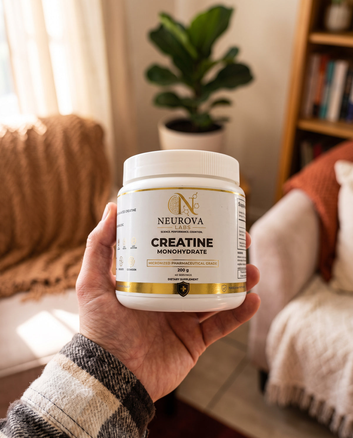 Neurova Labs Creatine Monohydrate tub held in hand